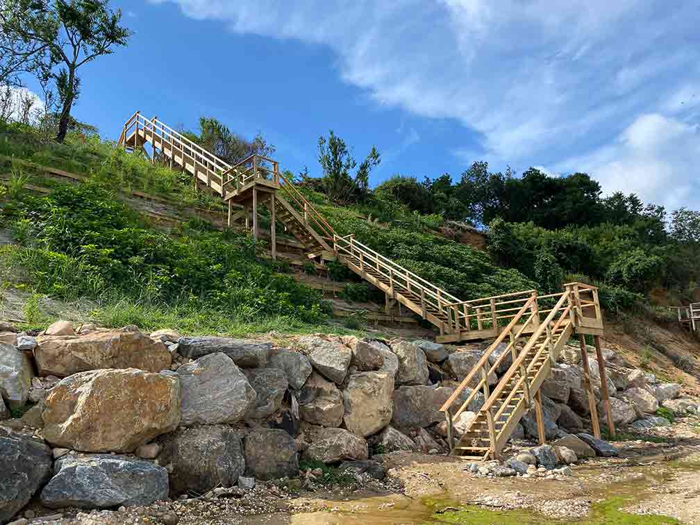completed beachfront restoration with stairs