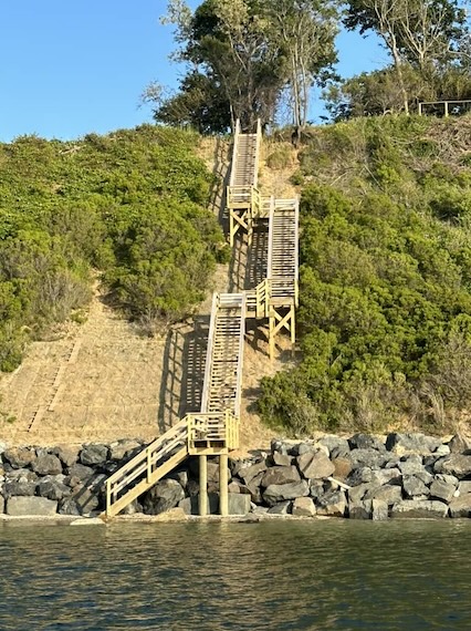 terraced bluff with stone revetment and stairs